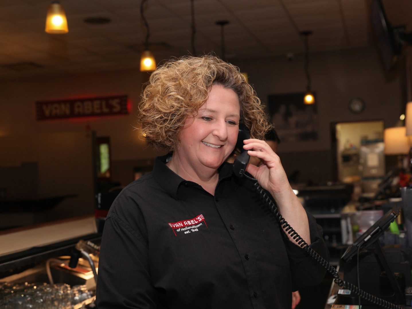 Owner of the VanAbles talking on the phone