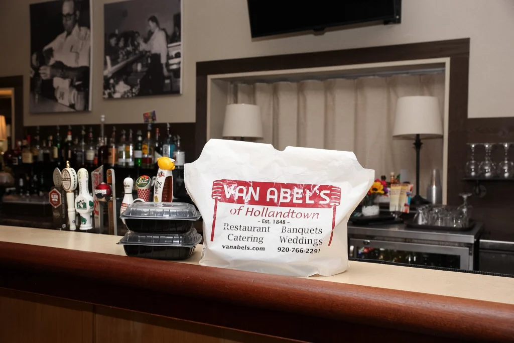 Take-out bag with vanabels of hollandtown logo